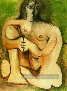 Femme accroupie nue sur fond vert 1960 cubiste Pablo Picasso Peinture à l'huile